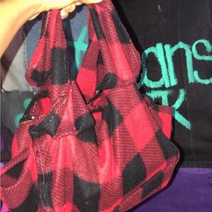 8x17. Handles for support of items. No pockets. Button attachment to secure